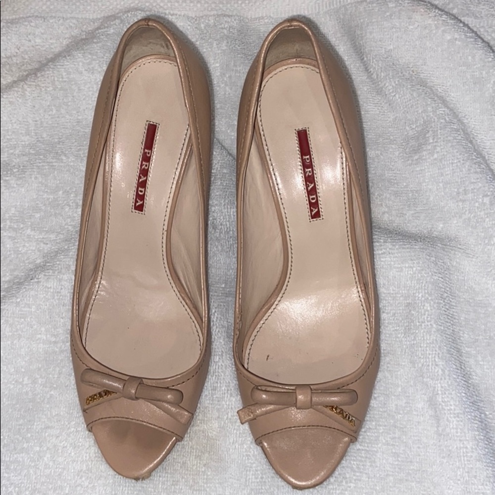 Authentic Prada beige leather peep toe logo pumps